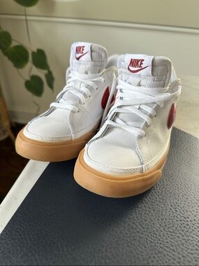 Nike Kids White Sneakers with Red Swoosh and Gum Sole